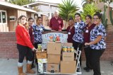 The LHS Nursing Program donated canned goods to Lemoore Christian Aid. Members (L to R) are Jewels Halkum, Rhema Delcampo, Alejandra Khan, LCA Director Nick Francu, MJ Bresenio, Jeanette Cisneros, Amy Nunez, Jade Jaramillo.
